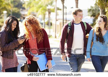 Students Walking Outdoors On University Campus View Large Photo Image Stock Photo - Students Walking Outdoors On University Campus. Fotosearch
