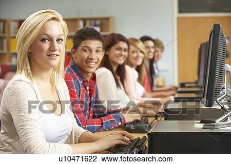 Students working on computers in library View Large Photo Image Stock Image - Students working on computers in library. Fotosearch