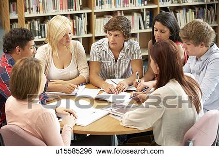 Students working together in library View Large Photo Image Stock Photograph - Students working together in library. Fotosearch