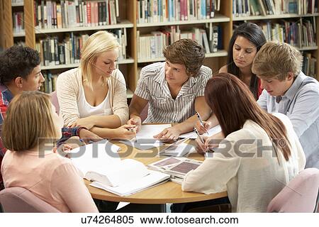 Students working together in library View Large Photo Image Stock Photography - Students working together in library. Fotosearch