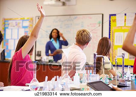 Teacher And Pupils In High School Science Class View Large Photo Image Picture - Teacher And Pupils In High School Science Class. Fotosearch
