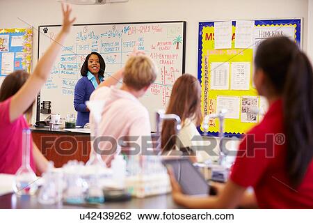 Teacher And Pupils In High School Science Class View Large Photo Image Stock Image - Teacher And Pupils In High School Science Class. Fotosearch