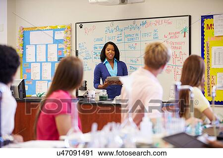 Teacher And Pupils In High School Science Class View Large Photo Image Stock Image - Teacher And Pupils In High School Science Class. Fotosearch