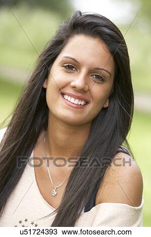 Stock Image - Teenage girl outdoors. Fotosearch