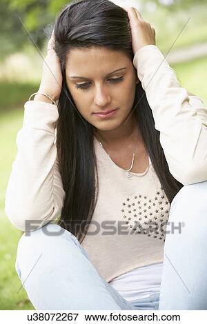 Stock Photo - Teenage girl outdoors. Fotosearch