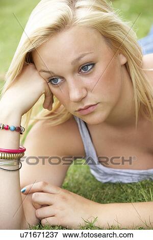 Stock Photo - Teenage girl outdoors. Fotosearch
