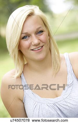 Stock Photo - Teenage girl outdoors. Fotosearch