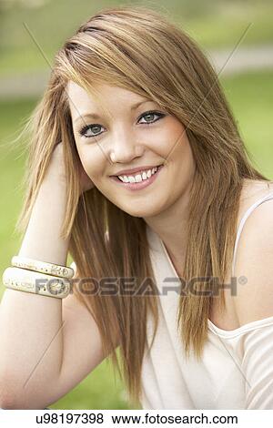 Stock Photo - Teenage girl outdoors. Fotosearch