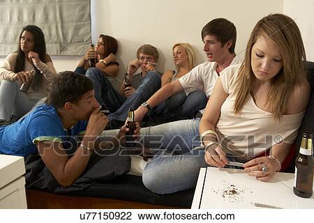 Teenagers drinking and smoking View Large Photo Image Stock Image - Teenagers drinking and smoking. Fotosearch