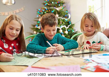 Three Children Writing Letters To Santa Together View Large Photo Image Stock Image - Three Children Writing Letters To Santa Together. Fotosearch