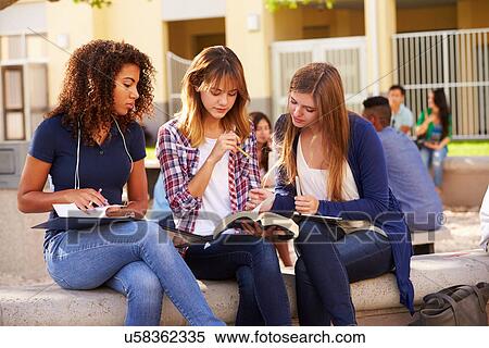 Three Female High School Students Working On Campus View Large Photo Image Stock Photography - Three Female High School Students Working On Campus . Fotosearch