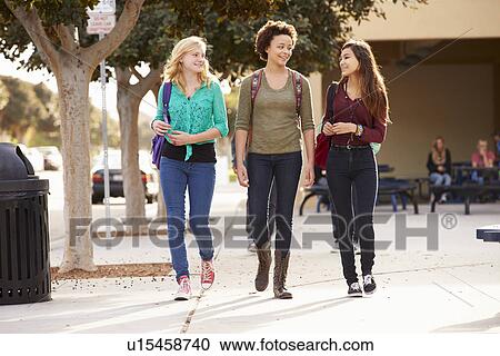 Three Female Students Walking To High School View Large Photo Image Stock Image - Three Female Students Walking To High School. Fotosearch