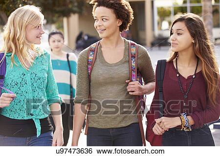 Three Female Students Walking To High School View Large Photo Image Stock Photograph - Three Female Students Walking To High School. Fotosearch