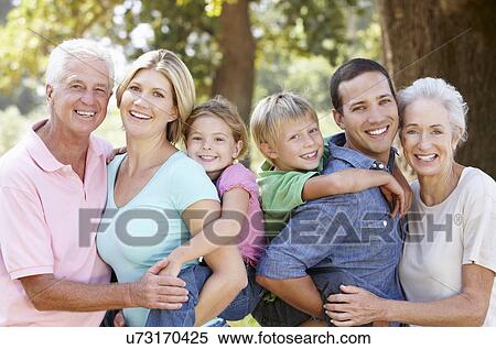 Stock Photography - Three generation family in the country. Fotosearch