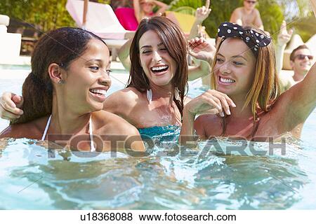 Three Women Having Fun In Swimming Pool View Large Photo Image Stock Photo - Three Women Having Fun In Swimming Pool. Fotosearch