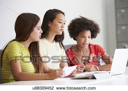 Three Women Working Together In Design Studio View Large Photo Image Stock Image - Three Women Working Together In Design Studio. Fotosearch