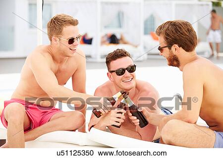 Three Young Male Friends On Holiday By Pool Together View Large Photo Image Stock Image - Three Young Male Friends On Holiday By Pool Together. Fotosearch