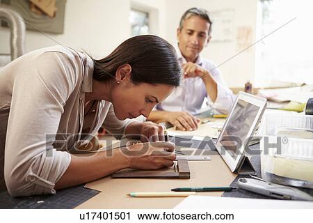 Two Architects Making Models In Office Using Digital Tablet View Large Photo Image Stock Image - Two Architects Making Models In Office Using Digital Tablet. Fotosearch