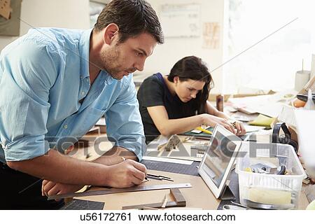 Two Architects Making Models In Office Using Digital Tablet View Large Photo Image Stock Image - Two Architects Making Models In Office Using Digital Tablet. Fotosearch