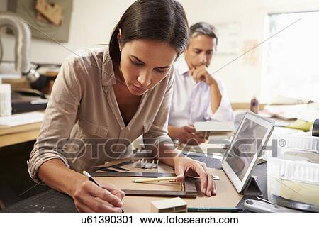 Two Architects Making Models In Office Using Digital Tablet View Large Photo Image Stock Image - Two Architects Making Models In Office Using Digital Tablet. Fotosearch