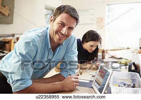Two Architects Making Models In Office Using Digital Tablet View Large Photo Image Stock Photography - Two Architects Making Models In Office Using Digital Tablet. Fotosearch