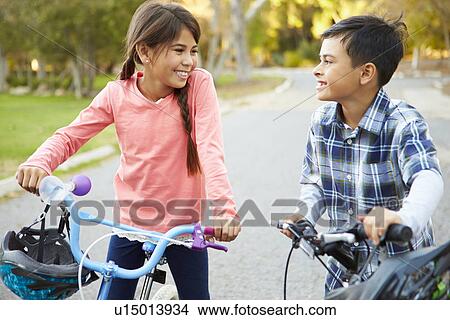Two Children On Cycle Ride In Countryside View Large Photo Image Picture - Two Children On Cycle Ride In Countryside. Fotosearch