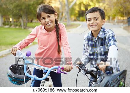 Two Children On Cycle Ride In Countryside View Large Photo Image Stock Photograph - Two Children On Cycle Ride In Countryside. Fotosearch