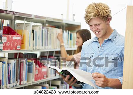 Two College Students Studying In Library View Large Photo Image Stock Photo - Two College Students Studying In Library. Fotosearch