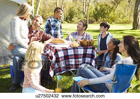 Two Families Enjoying Camping Holiday In Countryside View Large Photo Image Stock Image - Two Families Enjoying Camping Holiday In Countryside. Fotosearch
