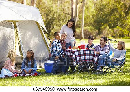 Two Families Enjoying Camping Holiday In Countryside View Large Photo Image Stock Image - Two Families Enjoying Camping Holiday In Countryside. Fotosearch