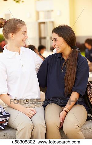Two Female High School Students Wearing Uniform View Large Photo Image Stock Image - Two Female High School Students Wearing Uniform . Fotosearch