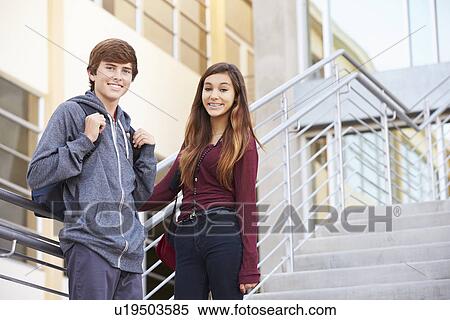 Two High School Students Standing Outside Building View Large Photo Image Stock Photography - Two High School Students Standing Outside Building. Fotosearch