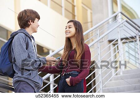 Two High School Students Standing Outside Building View Large Photo Image Stock Photography - Two High School Students Standing Outside Building. Fotosearch