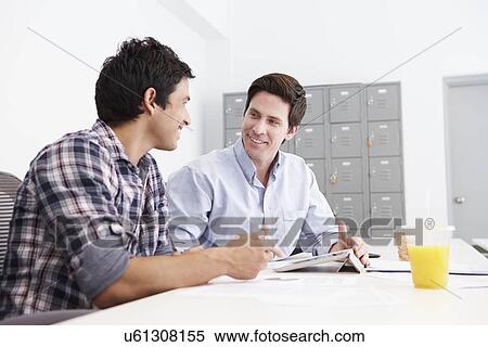 Two Men Working Together In Design Studio View Large Photo Image Stock Photography - Two Men Working Together In Design Studio. Fotosearch