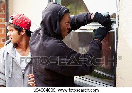Two Young Men Breaking Into House View Large Photo Image Stock Image - Two Young Men Breaking Into House. Fotosearch