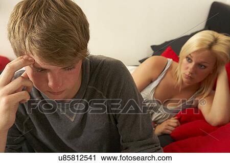Unhappy teenage couple View Large Photo Image Stock Image - Unhappy teenage couple. Fotosearch