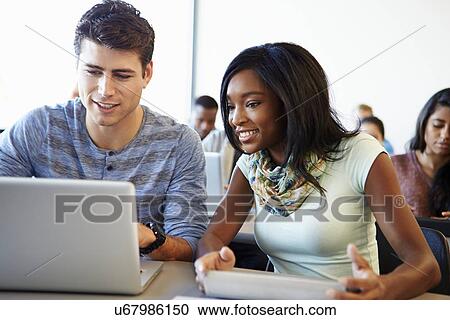 University Students Using Digital Tablet And Laptop In Class View Large Photo Image Stock Image - University Students Using Digital Tablet And Laptop In Class. Fotosearch