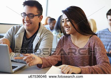 University Students Using Digital Tablet And Laptop In Class View Large Photo Image Stock Photograph - University Students Using Digital Tablet And Laptop In Class. Fotosearch