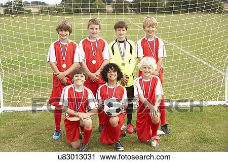 Winning junior football team portrait View Large Photo Image Stock Image - Winning junior football team portrait. Fotosearch