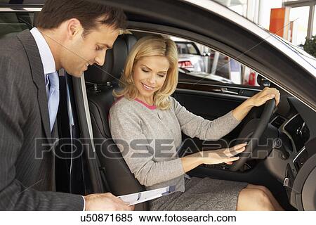 Woman buying new car View Large Photo Image Stock Photography - Woman buying new car. Fotosearch