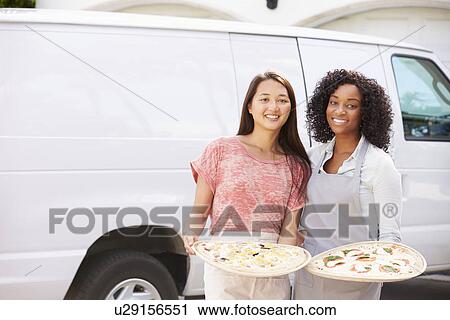 Woman Delivering Pizza Standing In Front Of Van View Large Photo Image Stock Image - Woman Delivering Pizza Standing In Front Of Van. Fotosearch