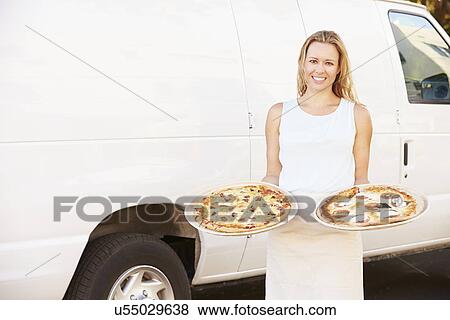 Woman Delivering Pizza Standing In Front Of Van View Large Photo Image Stock Photo - Woman Delivering Pizza Standing In Front Of Van. Fotosearch