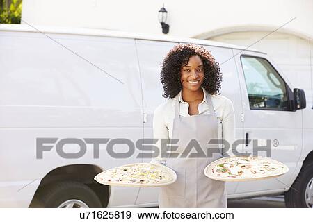 Woman Delivering Pizza Standing In Front Of Van View Large Photo Image Stock Photo - Woman Delivering Pizza Standing In Front Of Van. Fotosearch