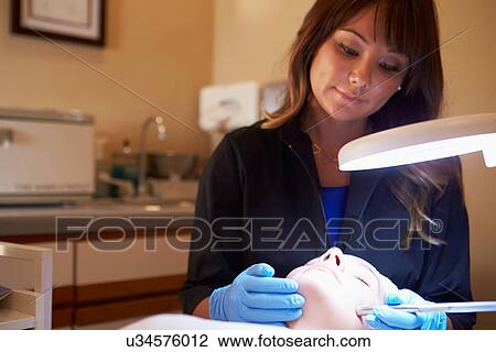 Woman Having Dermo Abrasion Cosmetic Treatment At Spa View Large Photo Image Stock Image - Woman Having Dermo Abrasion Cosmetic Treatment At Spa. Fotosearch