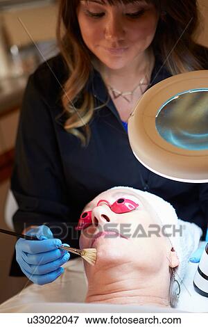 Stock Photo - Woman Having Dermo Abrasion Cosmetic Treatment At Spa. Fotosearch