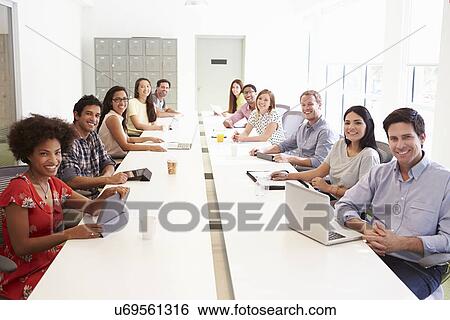 Woman Laughing At Desk In Design Studio View Large Photo Image Stock Photograph - Woman Laughing At Desk In Design Studio . Fotosearch