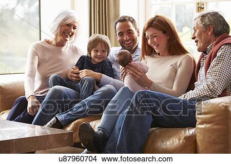 Picture - Woman On Roof Terrace Using Digital Tablet. Fotosearch