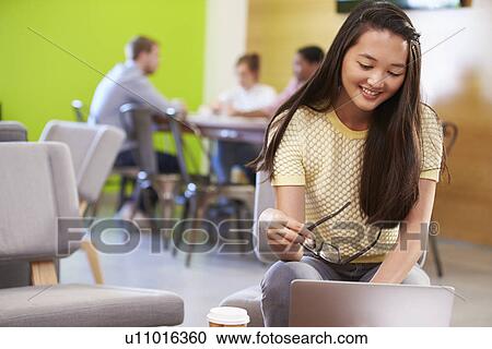 Woman Taking A Break Working In Design Studio View Large Photo Image Stock Image - Woman Taking A Break Working In Design Studio . Fotosearch