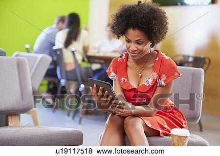 Woman Taking A Break Working In Design Studio View Large Photo Image Stock Photo - Woman Taking A Break Working In Design Studio . Fotosearch