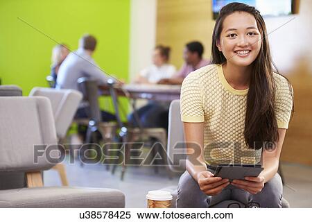 Woman Taking A Break Working In Design Studio View Large Photo Image Stock Photography - Woman Taking A Break Working In Design Studio . Fotosearch
